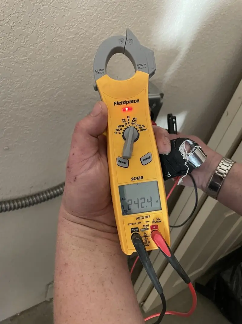 Voltage testing with clamp meter during Electrical Installation Services in Dade City North